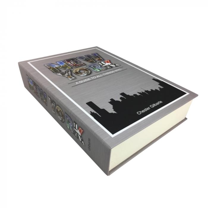 The Streetwise new york book safe with key to safely hide valuables shown in image how it looks when laid flat.