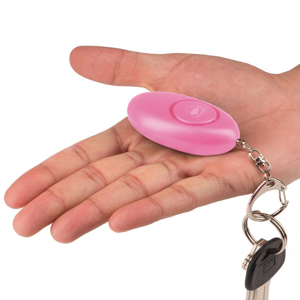 Guard Dog personal alarm. Excellent for emergency situations. Shown in pink color.